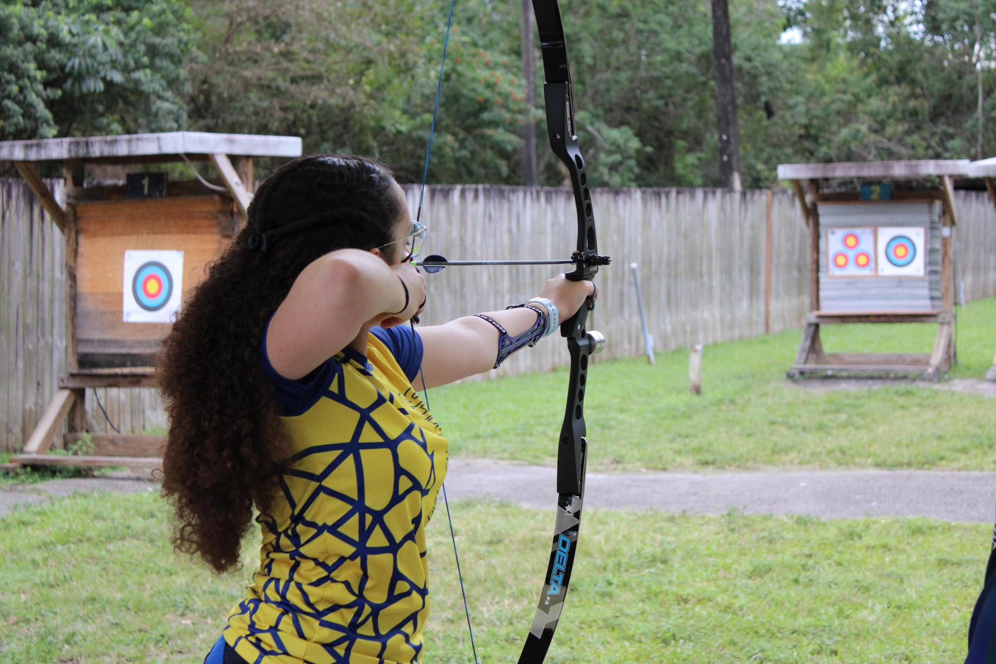 Cecilia shooting at targets